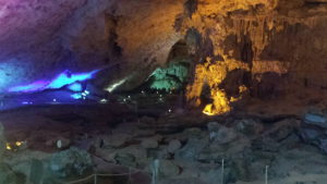 A monstrous network of caves, beautifully lit up with different colours. 